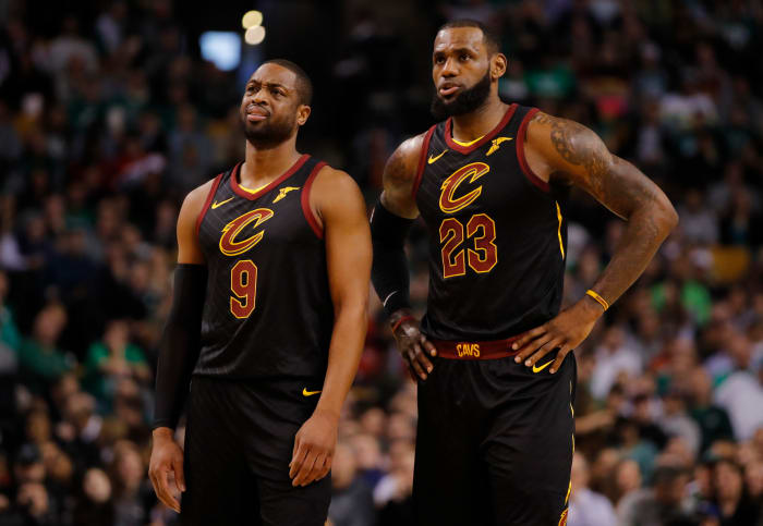 Jan 3, 2018; Boston, MA, USA; Cleveland Cavaliers guard Dwyane Wade (9) and forward LeBron James (23) talk on the court against the Boston Celtics in the first quarter at TD Garden. Mandatory Credit: David Butler II-USA TODAY Sports